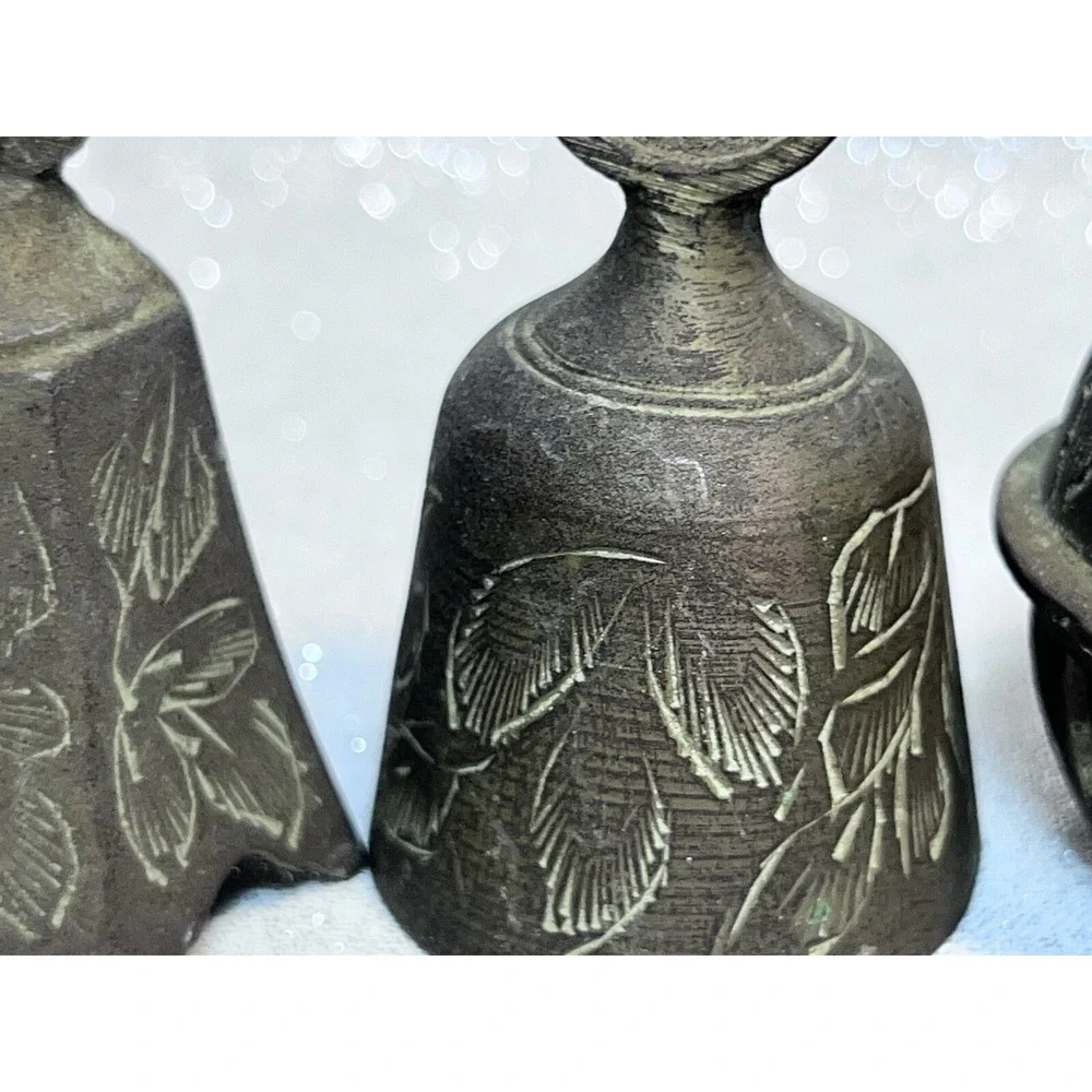 1 CLAW AND 2 BRASS HAND ETCHED BELLS FROM INDIA ALL ARE 2